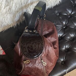 Marino Orlandi Brown Embossed Leather Sling Backpack with Black Patent Accent